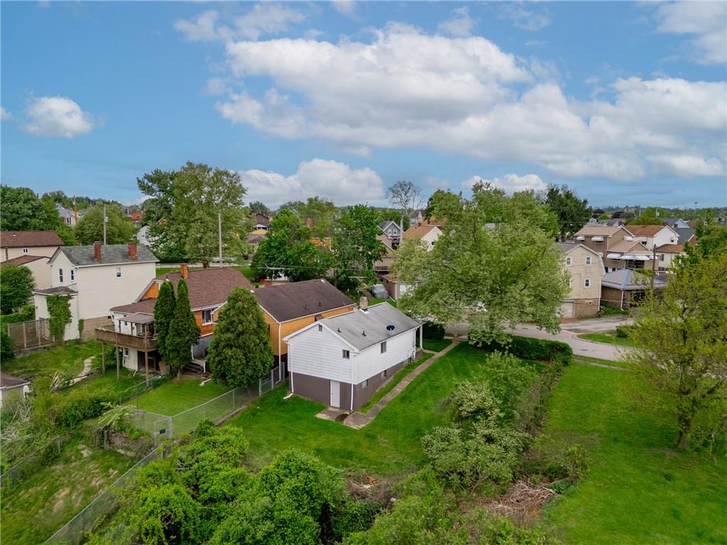 218 Vine Street Homestead, PA 15120 - Photo 36 of 36 an aerial view of a house with garden space and street view