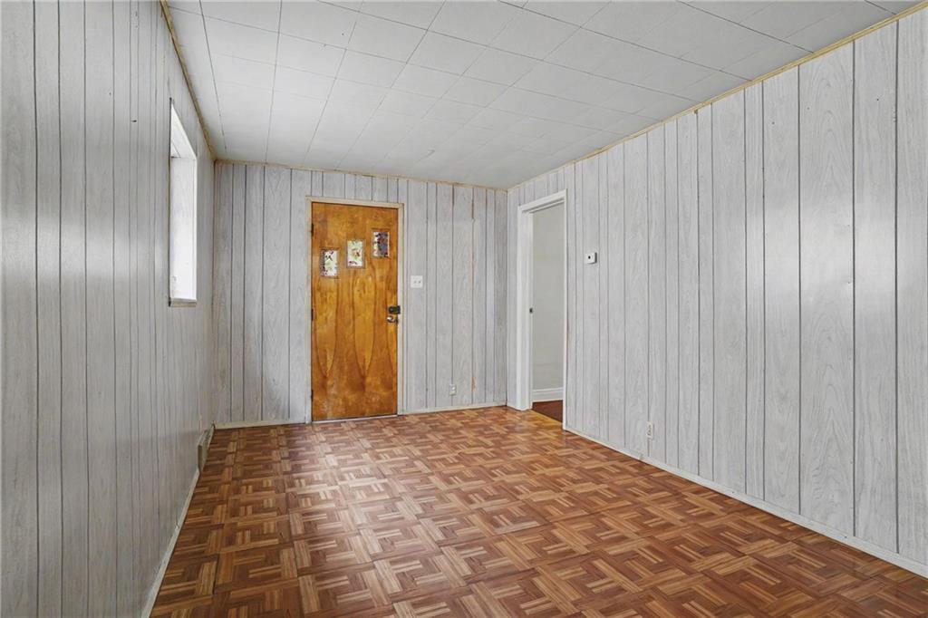 218 Vine Street Homestead, PA 15120 - Photo 6 of 36 a view of a room with a wooden door