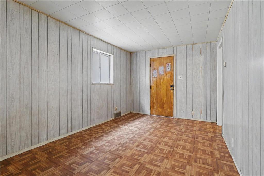 218 Vine Street Homestead, PA 15120 - Photo 7 of 36 a bedroom with a bed and a window