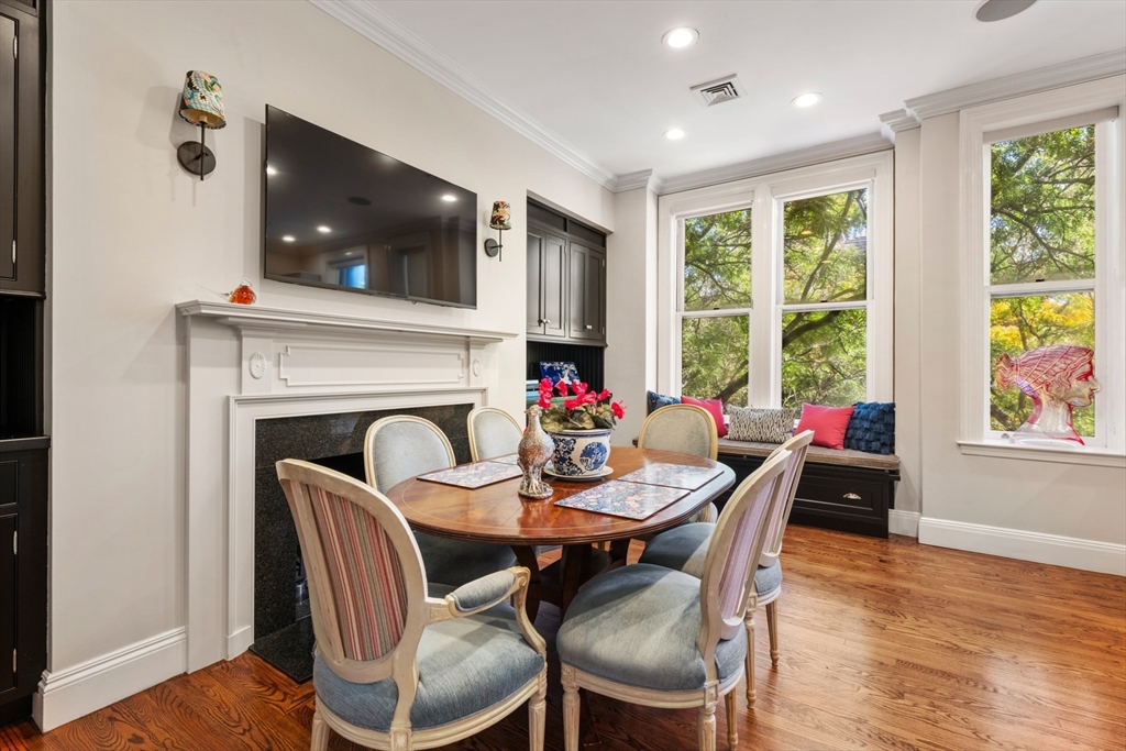 314 Dartmouth Street, Unit B Boston, MA 02116 - Photo 14 of 34 a view of a dining room with furniture window and wooden floor