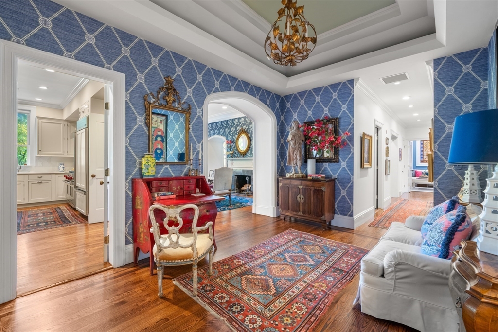 314 Dartmouth Street, Unit B Boston, MA 02116 - Photo 28 of 34 a living room with furniture or chandelier and a rug