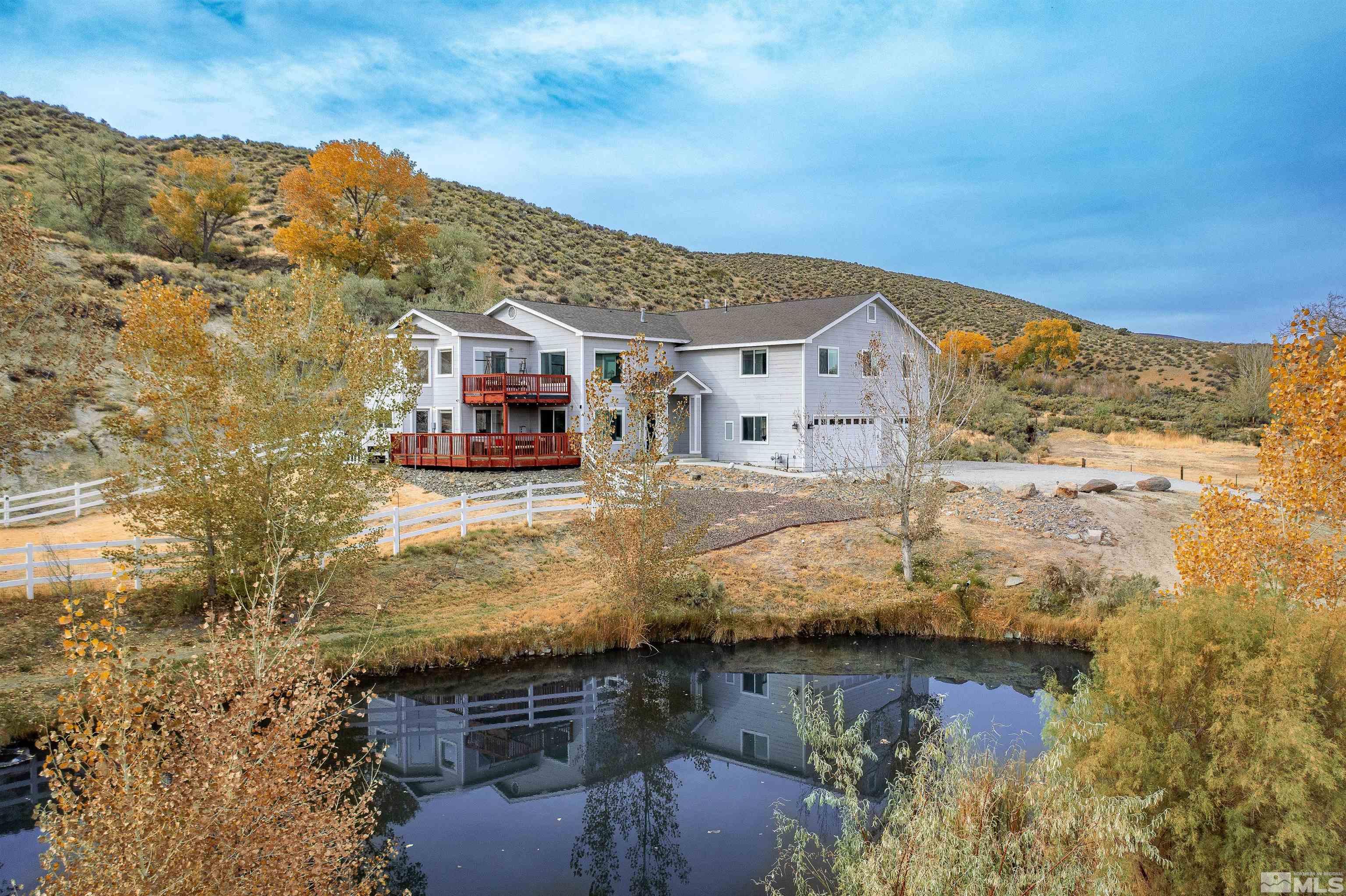 3172 Washoe Springs Road Minden, NV 89423 - Photo 1 of 40 a view of a house with a lake view