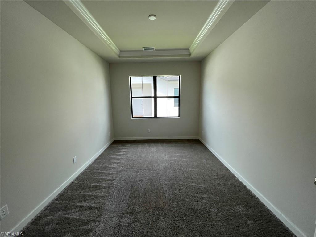 14815 Loggerhead Drive Naples, FL 34120 - Photo 11 of 29 an empty room with a window