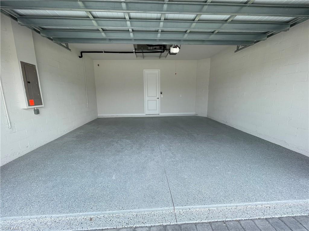 14815 Loggerhead Drive Naples, FL 34120 - Photo 26 of 29 a view of a room with racks on the wall