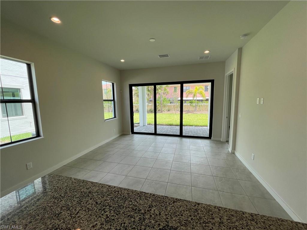 14815 Loggerhead Drive Naples, FL 34120 - Photo 7 of 29 a view of an empty room with a window