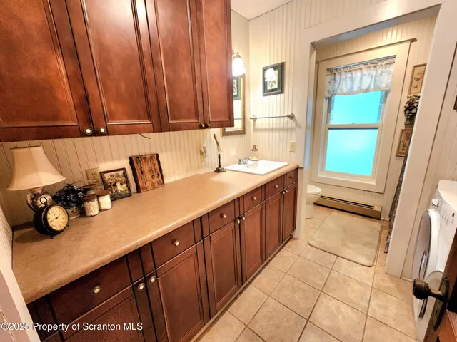 a bathroom with a shower curtain