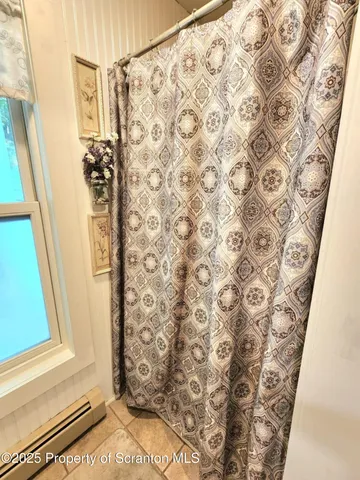 a bedroom with a bed and furniture