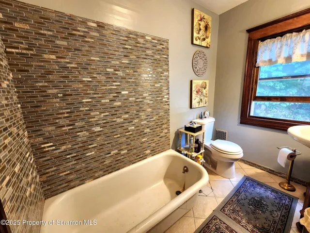 a view of livingroom with hardwood floor and hallway