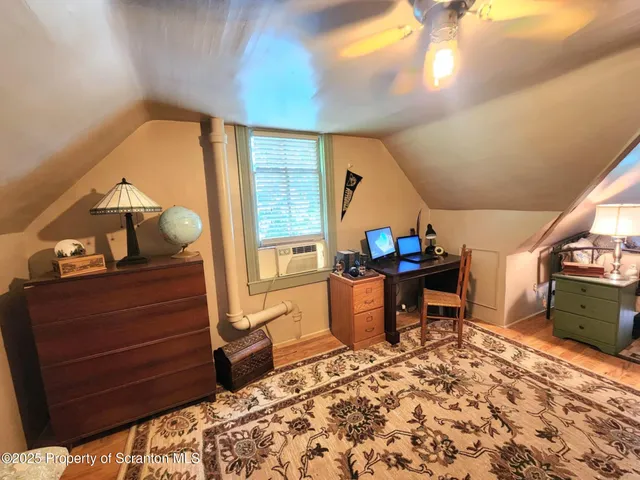 a backyard of a house with outdoor seating