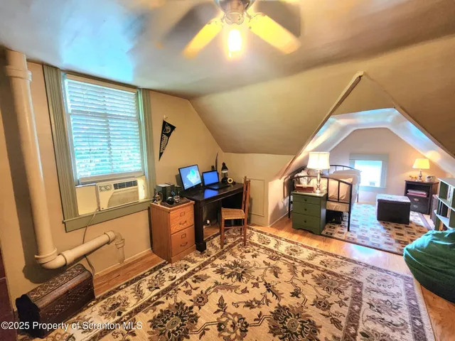 a view of a backyard with plants and a patio