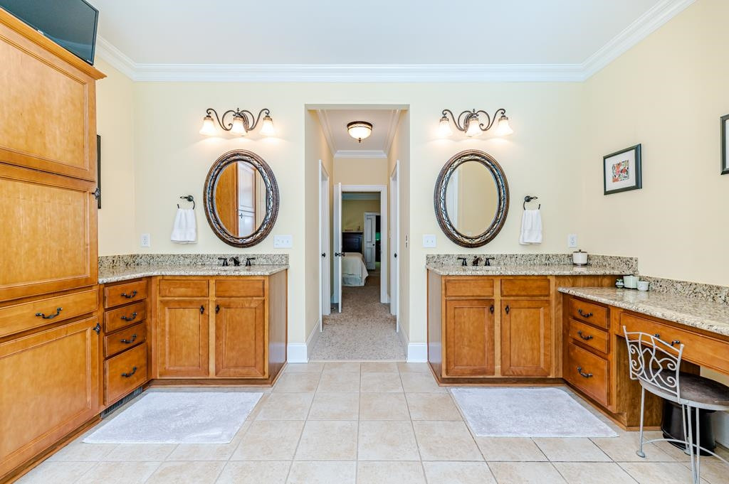 225 Henrys Ridge Road Pittsboro, NC 27312 - Photo 30 of 67 Glamorous primary bath with separate double sinks & vanities.
