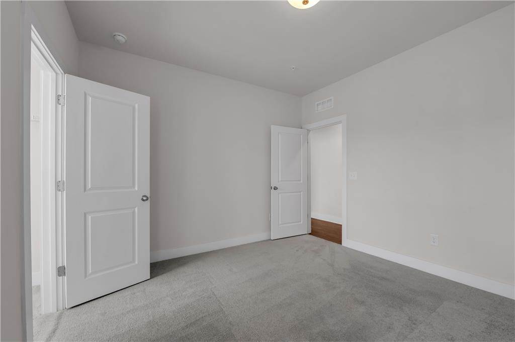 1230 Weatherway Lane Cumming, GA 30041 - Photo 21 of 34 a view of an empty room