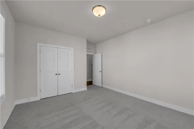a bathroom with a sink toilet vanity and bathtub