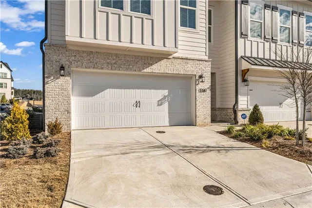 a view of front door of house with stairs