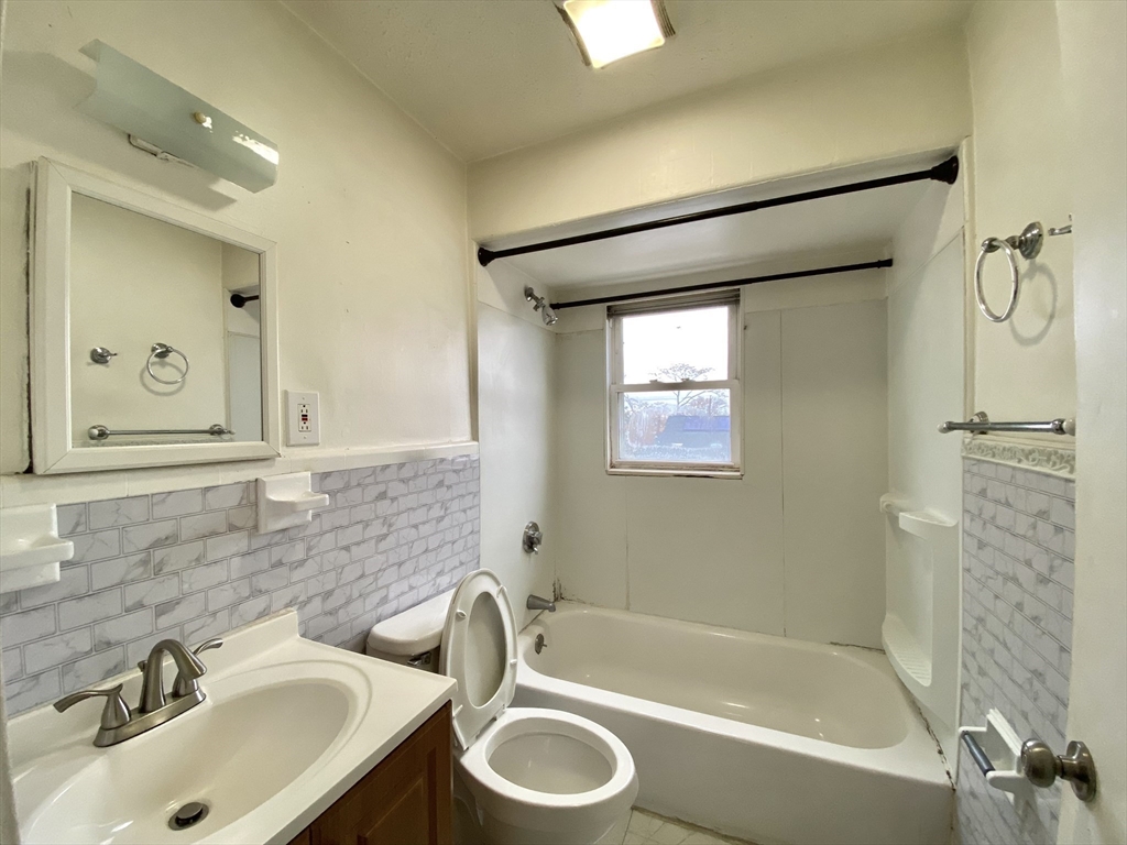 530 Beach Street, Unit 2 Revere, MA 02151 - Photo 7 of 7 a bathroom with a sink toilet and shower