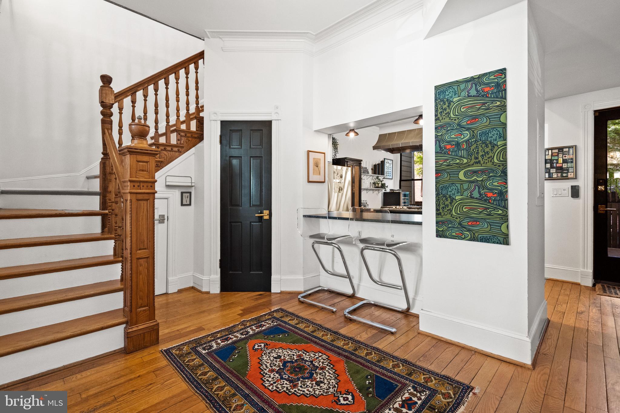 2026 15th Street Northwest Washington, DC 20009 - Photo 11 of 47 a view of a hallway with furniture and front door