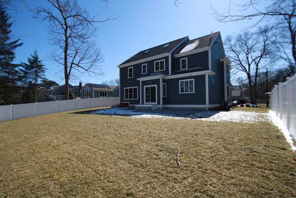 31 Helen Road Needham, MA 02492 - Photo 2 of 11 a front view of house with yard