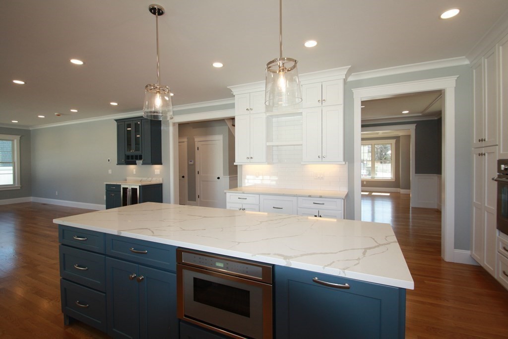 31 Helen Road Needham, MA 02492 - Photo 5 of 11 a kitchen with a stove a refrigerator and a sink