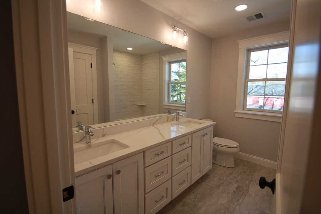 31 Helen Road Needham, MA 02492 - Photo 8 of 11 a spacious bathroom with a granite countertop sink toilet and shower