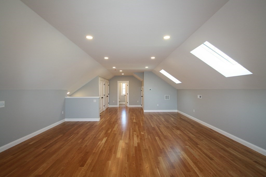 31 Helen Road Needham, MA 02492 - Photo 10 of 11 a view of empty room with wooden floor