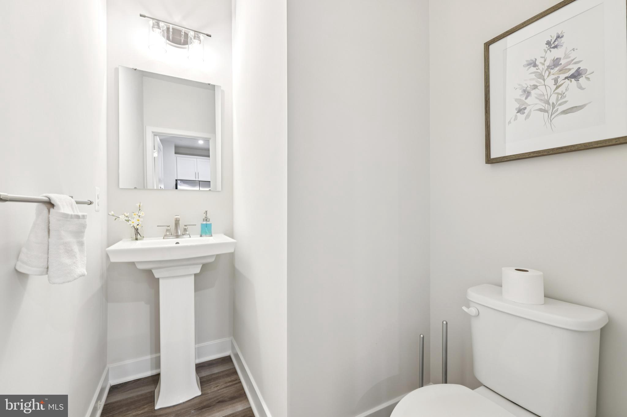 1716 Atlas Drive Frederick, MD 21702 - Photo 15 of 48 a bathroom with a sink toilet and a mirror