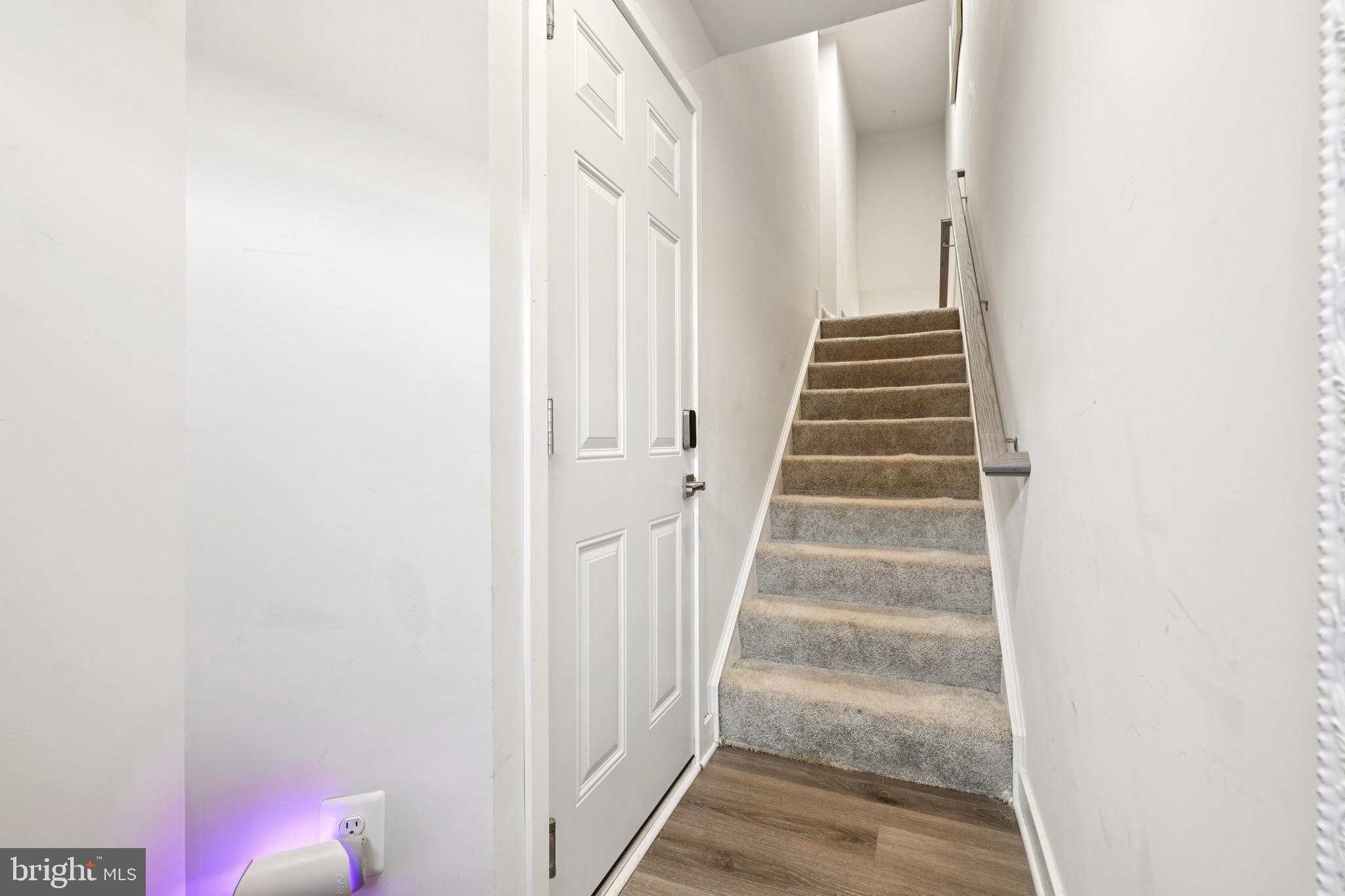 1716 Atlas Drive Frederick, MD 21702 - Photo 18 of 48 a view of a hallway with wooden floor and entryway