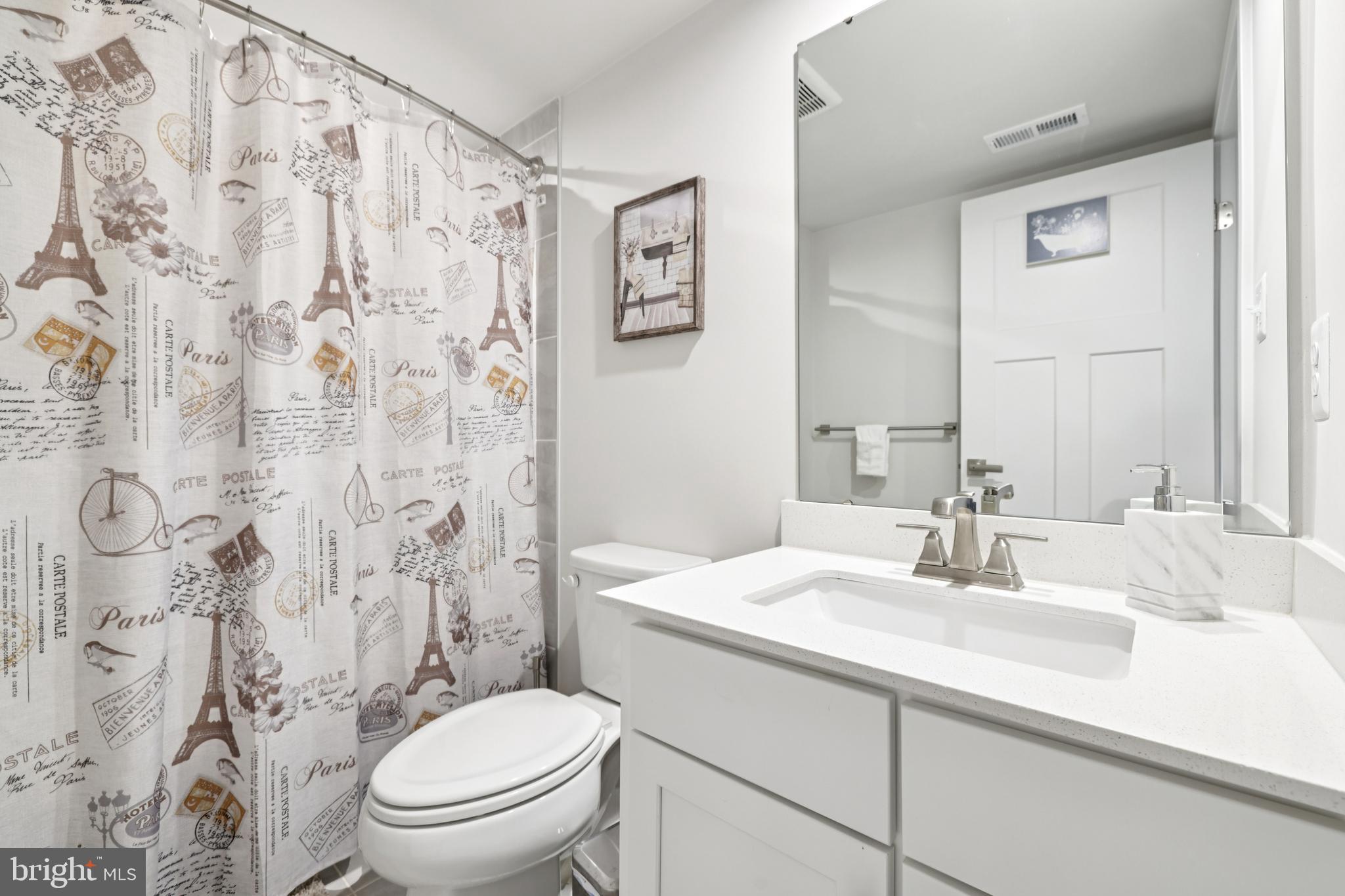 1716 Atlas Drive Frederick, MD 21702 - Photo 22 of 48 a bathroom with a sink toilet and shower