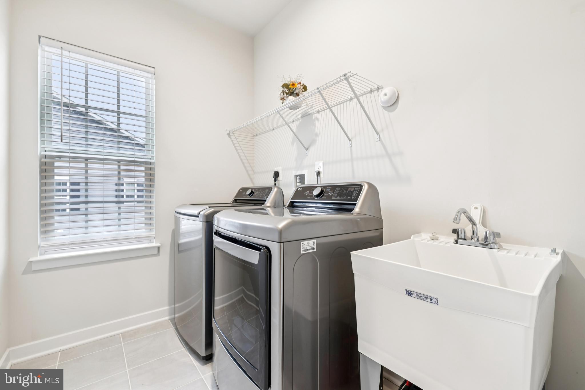 1716 Atlas Drive Frederick, MD 21702 - Photo 23 of 48 a utility room with dryer and washer