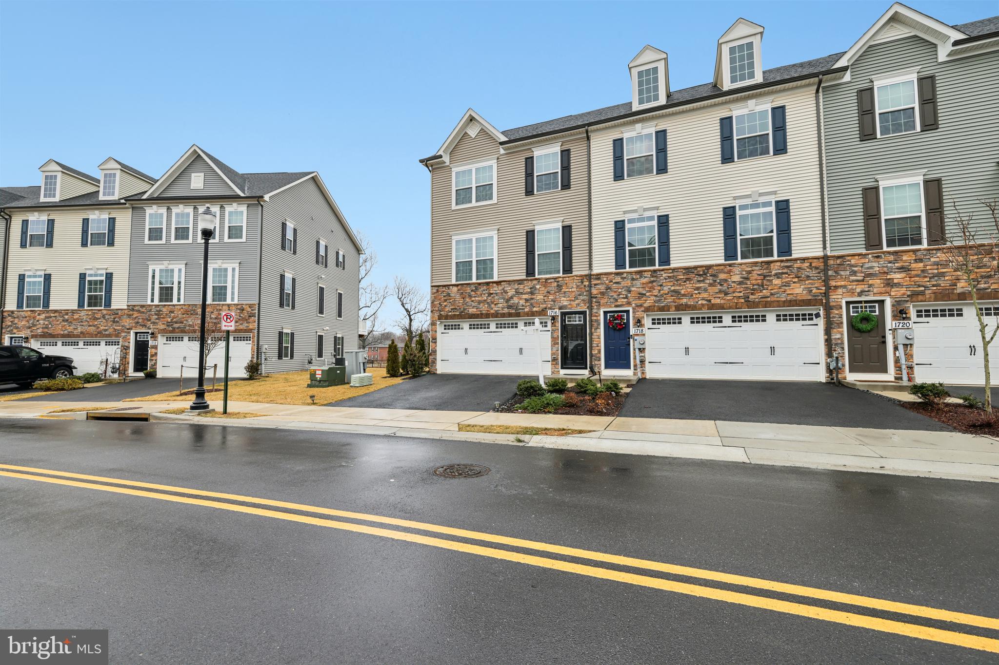 1716 Atlas Drive Frederick, MD 21702 - Photo 45 of 48 front view of a building with a street