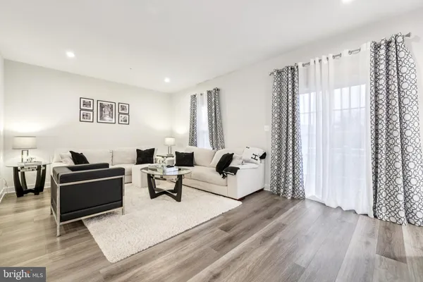 a living room with furniture and a couch