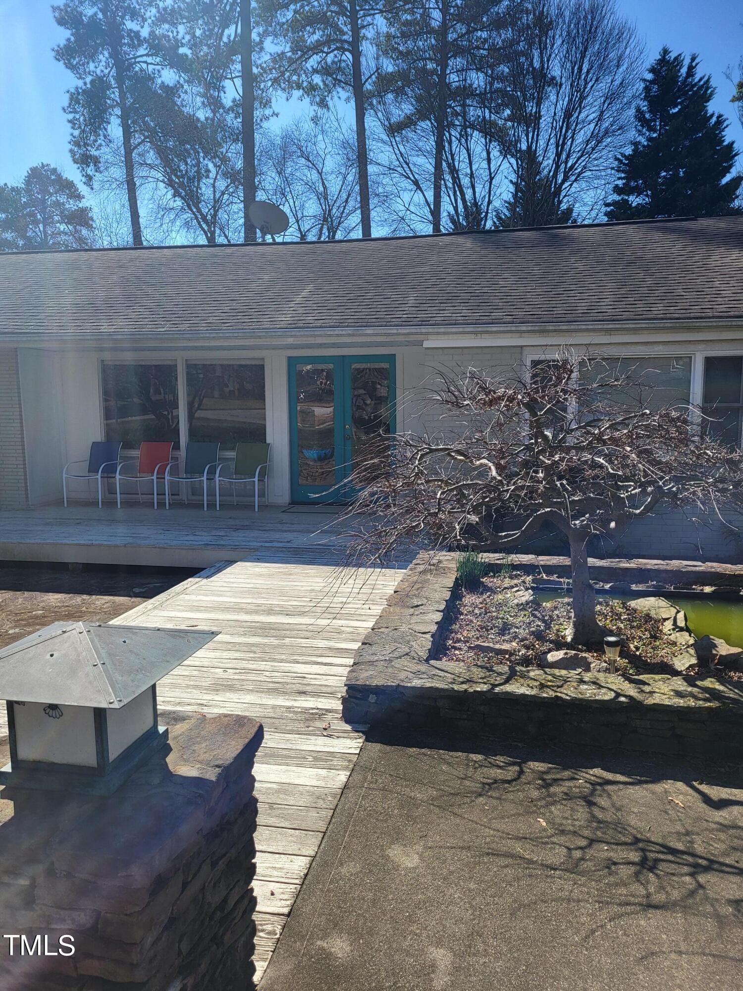 3403 Bradley Place Raleigh, NC 27607 - Photo 3 of 8 a view of swimming pool with outdoor seating