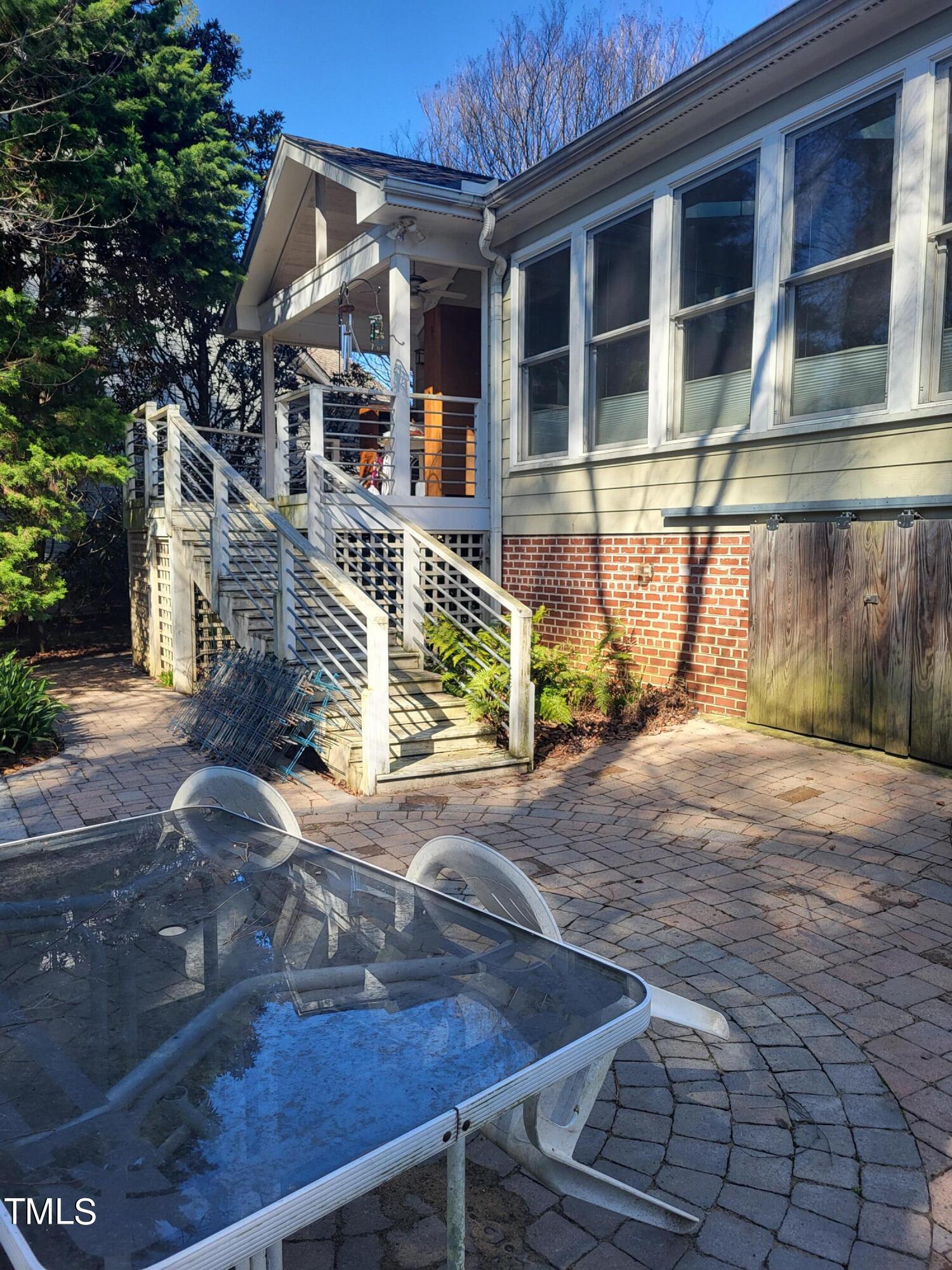 3403 Bradley Place Raleigh, NC 27607 - Photo 6 of 8 a view of a house with a wooden floor