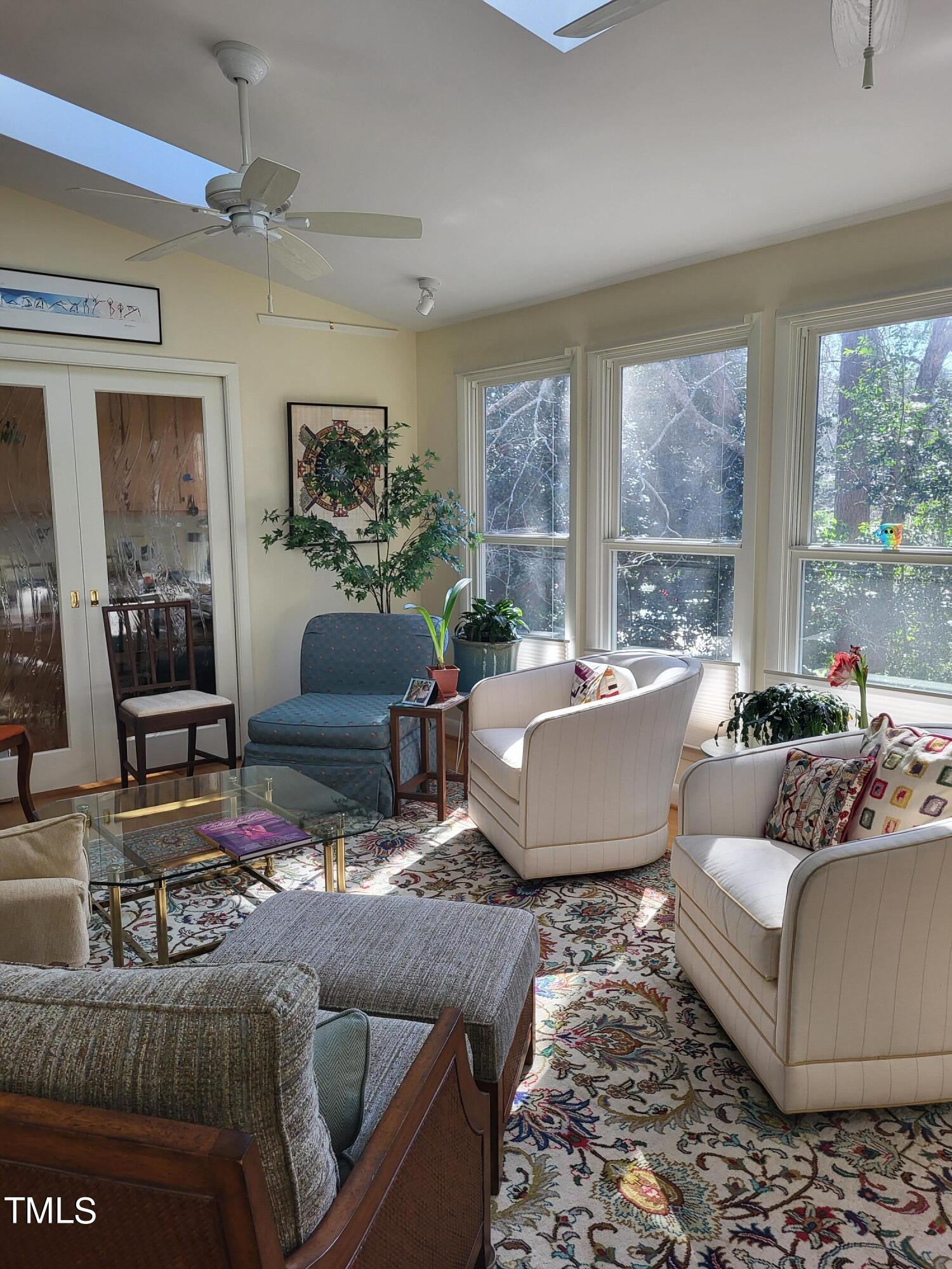 3403 Bradley Place Raleigh, NC 27607 - Photo 8 of 8 a living room with furniture and a large window