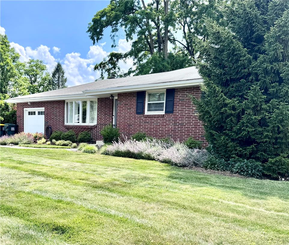 5334 Egypt Road Laurys Station, PA 18059 - Photo 42 of 55 A classic brick ranch home with bay windows and tidy landscaping offers welcoming curb appeal.