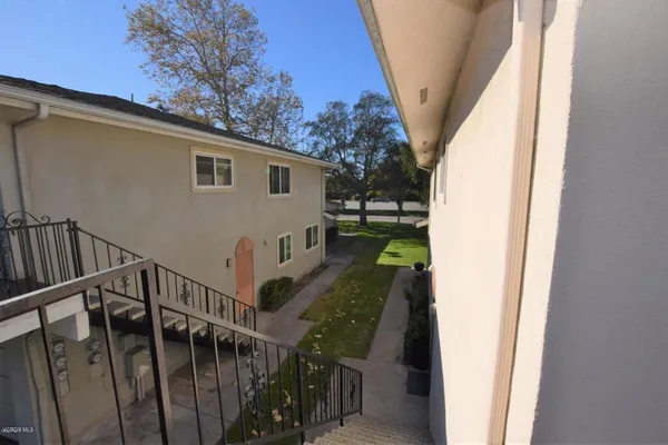 a view of a swimming pool with a backyard