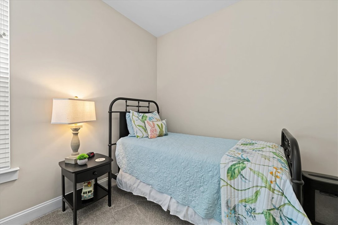 6834 Midway Road Pelzer, SC 29669 - Photo 35 of 50 This cozy bedroom provides a comfortable and inviting atmosphere.