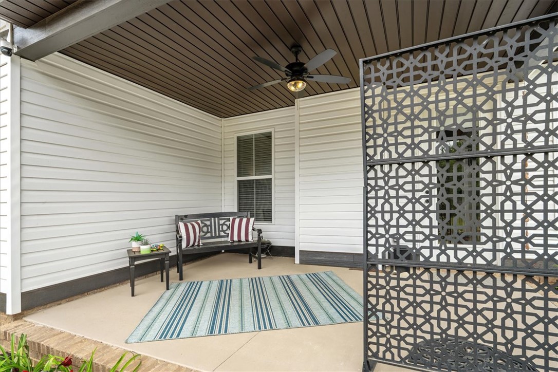6834 Midway Road Pelzer, SC 29669 - Photo 43 of 50 This inviting patio area offers a comfortable space for outdoor relaxation and enjoyment.