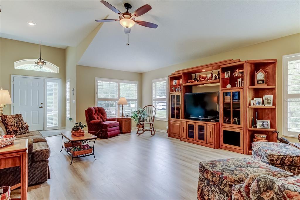 1610 Cortleigh Drive Trinity, FL 34655 - Photo 11 of 72 a bedroom with furniture and a flat screen tv