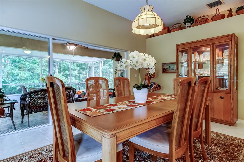 1610 Cortleigh Drive Trinity, FL 34655 - Photo 24 of 72 a view of a dining room with furniture window and outside view