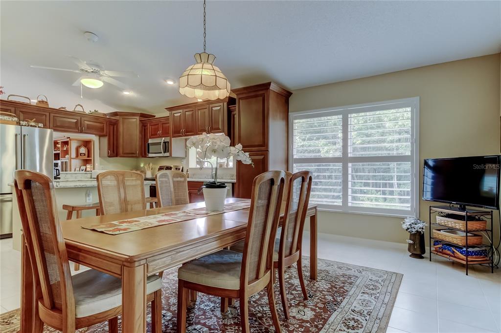 1610 Cortleigh Drive Trinity, FL 34655 - Photo 26 of 72 a view of a dining room with furniture window and outside view