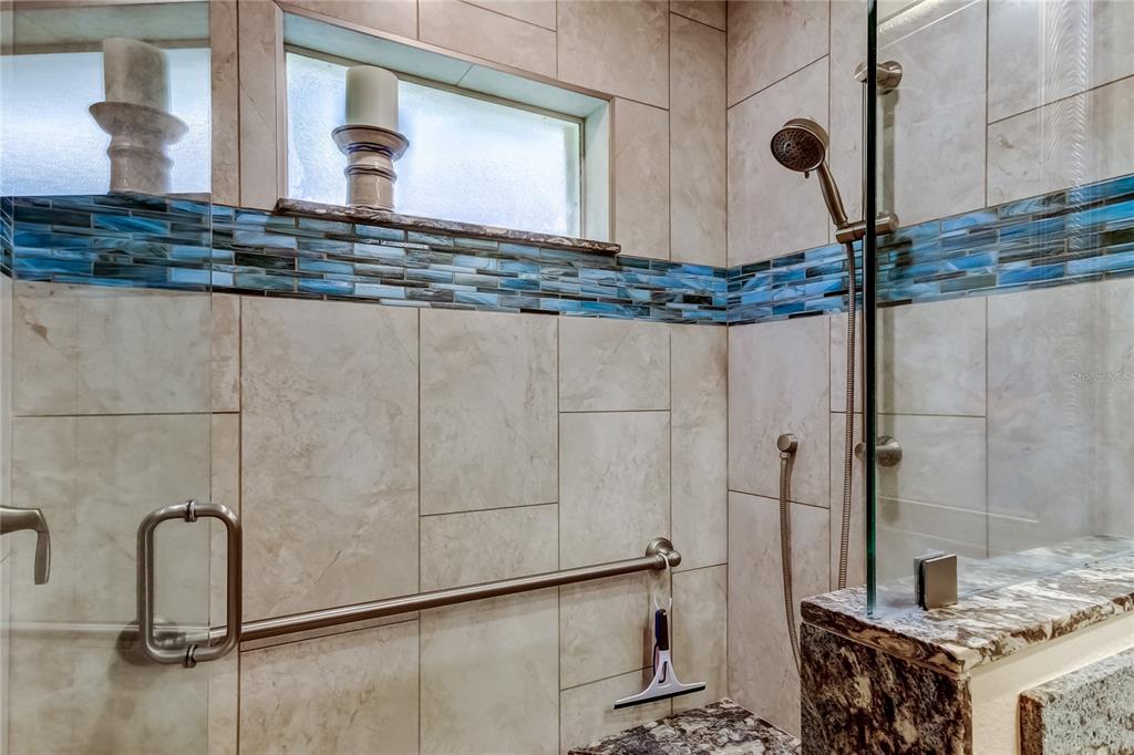 1610 Cortleigh Drive Trinity, FL 34655 - Photo 41 of 72 a bathroom with a granite countertop sink and a mirror