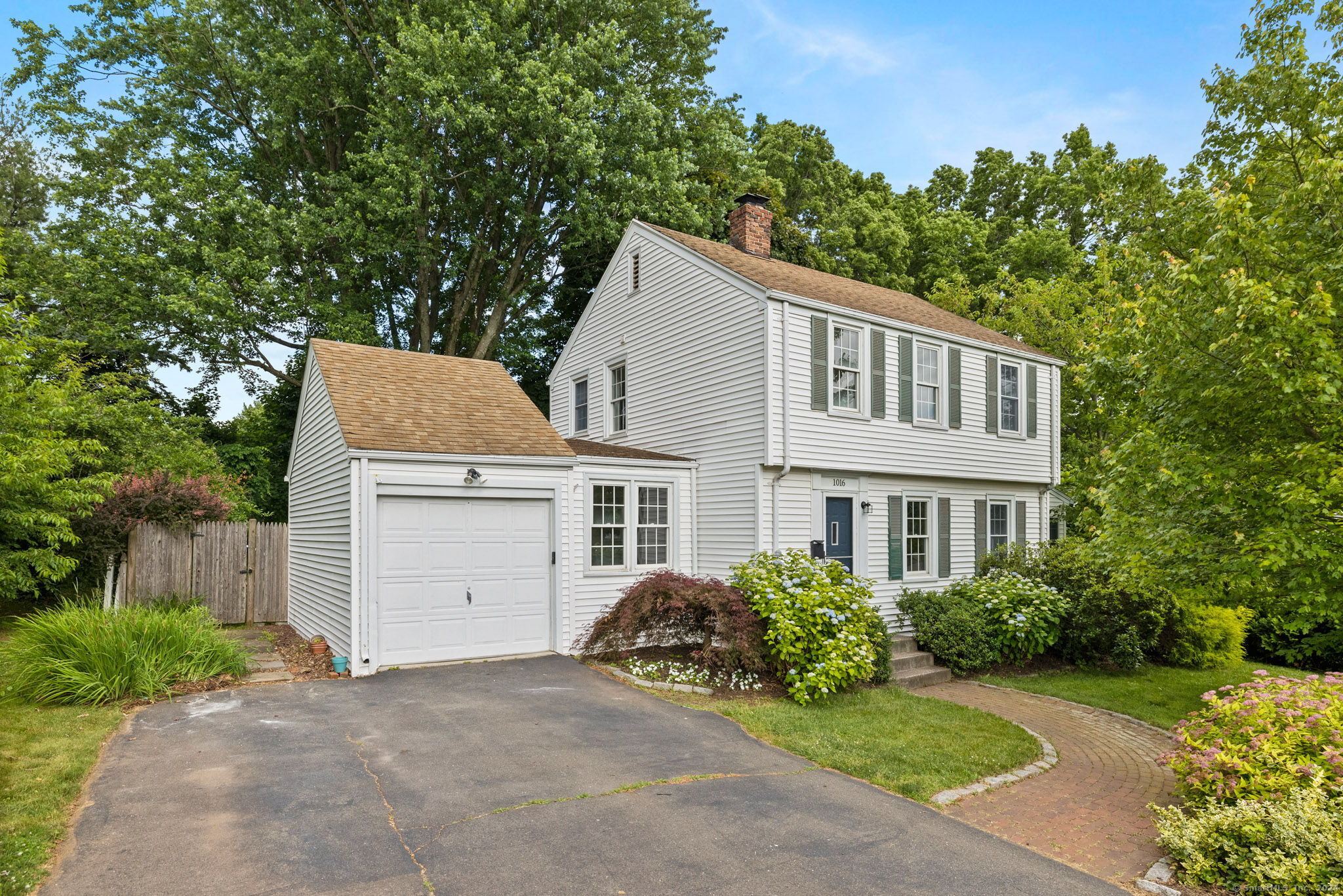 1016 Ridge Road Wethersfield, CT 06109 - Photo 1 of 1 a house view with a garden space
