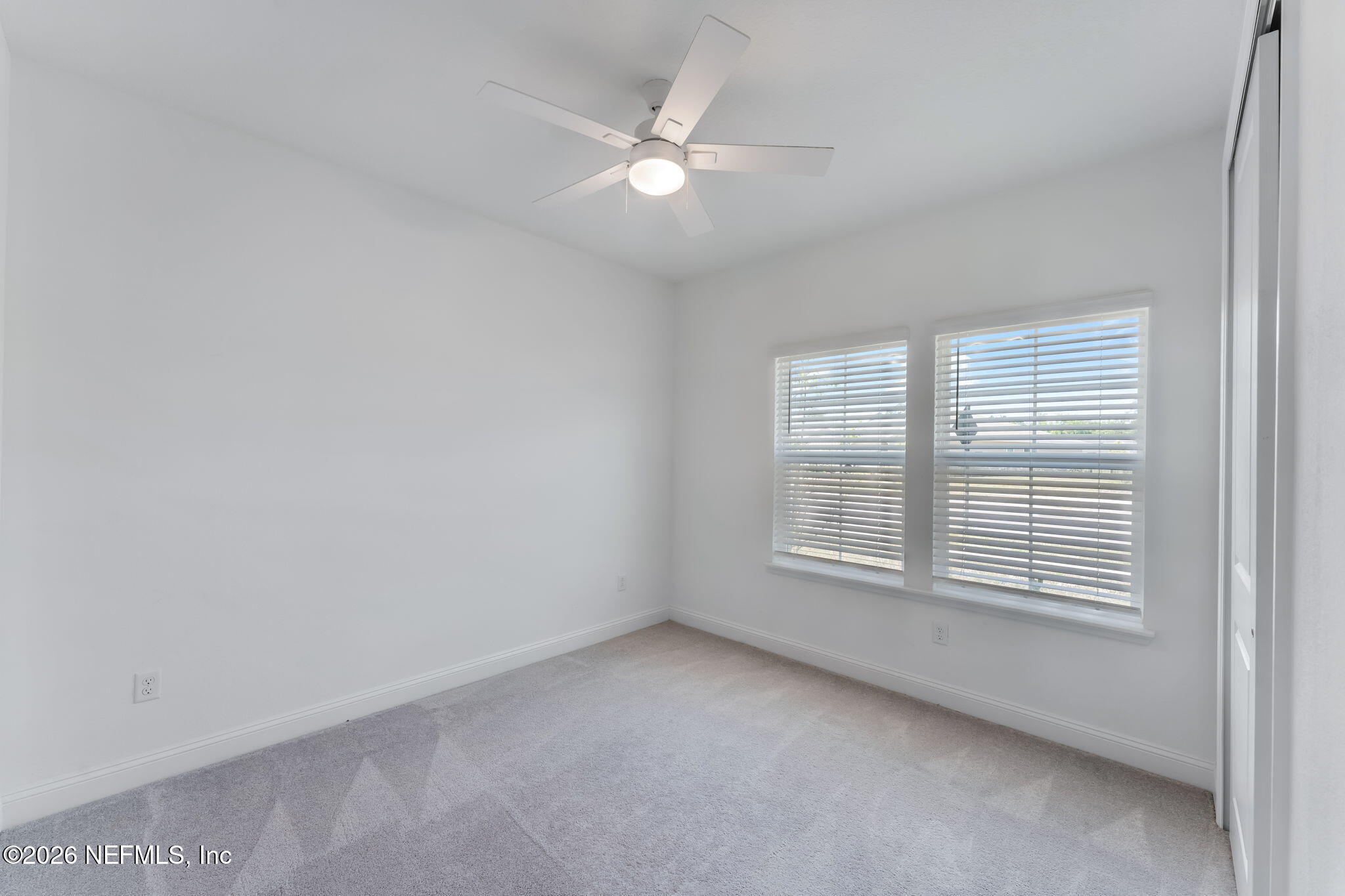 75776 Estuary Way Yulee, FL 32097 - Photo 13 of 20 a view of an empty room with a window