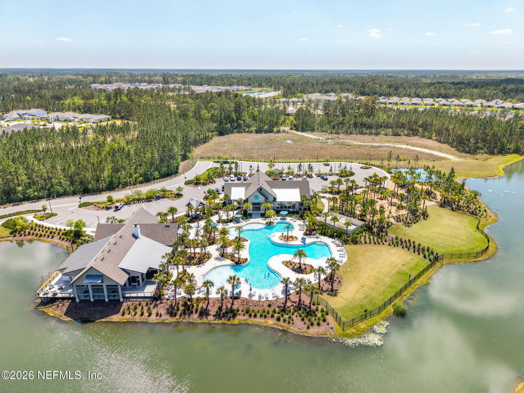 75776 Estuary Way Yulee, FL 32097 - Photo 18 of 20 an aerial view of residential houses with outdoor space and ocean view