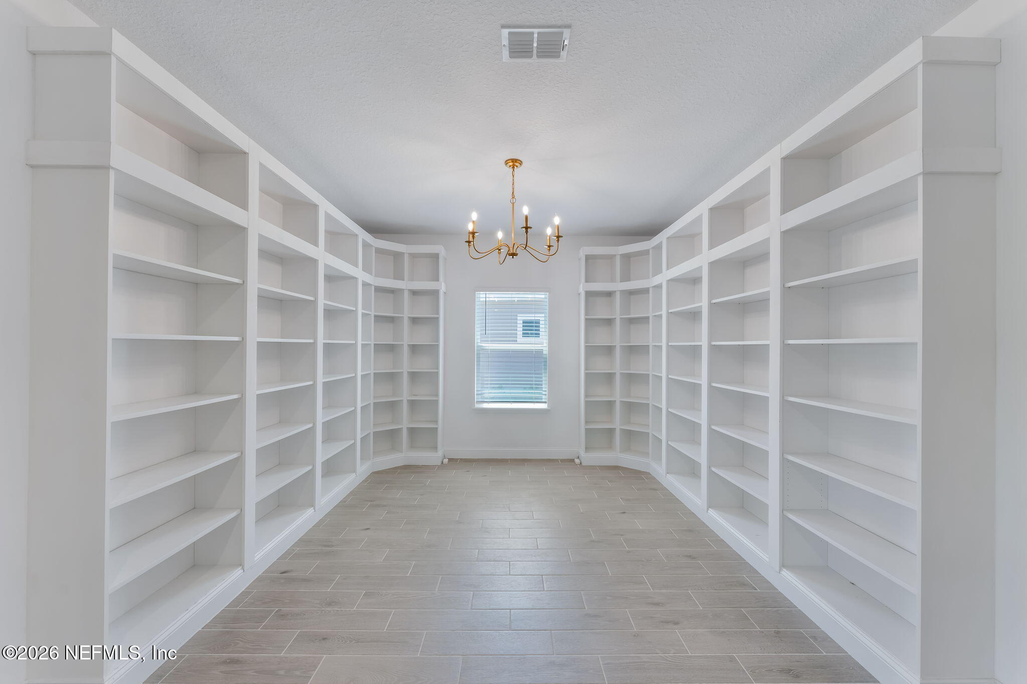 75776 Estuary Way Yulee, FL 32097 - Photo 6 of 20 a view of an empty room with a window