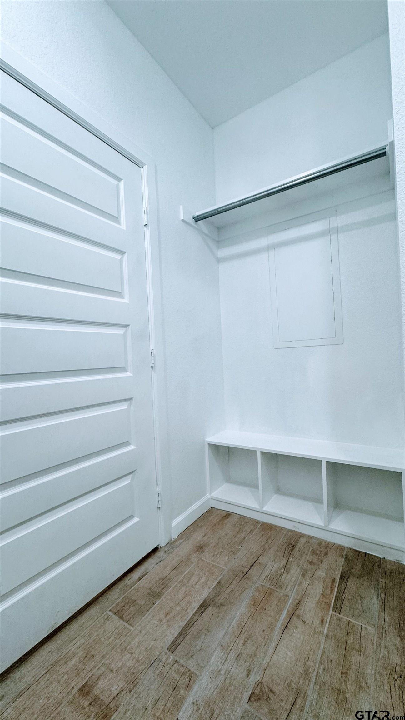 20428 High Point Drive Flint, TX 75762 - Photo 15 of 18 a view of an empty walk in closet