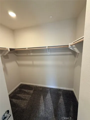 a view of small space with racks on the wall