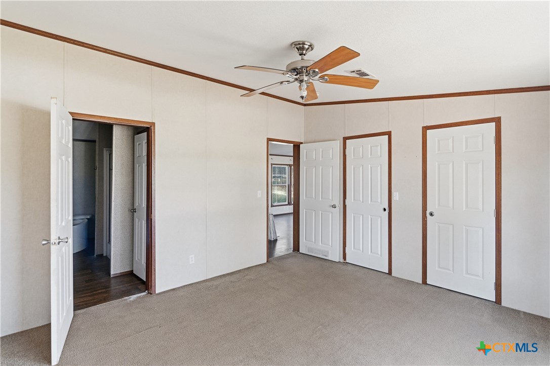 780 Oak Tree Road Seguin, TX 78155 - Photo 17 of 40 a view of a livingroom with a ceiling fan