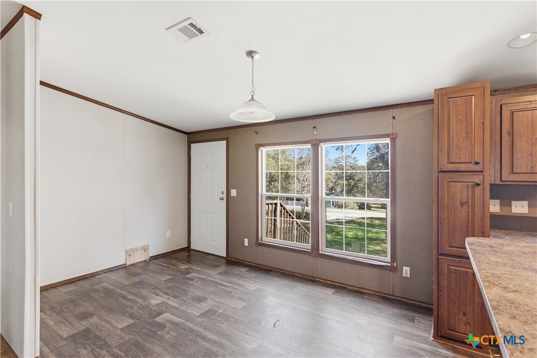 780 Oak Tree Road Seguin, TX 78155 - Photo 3 of 40 a view of an empty room with a window