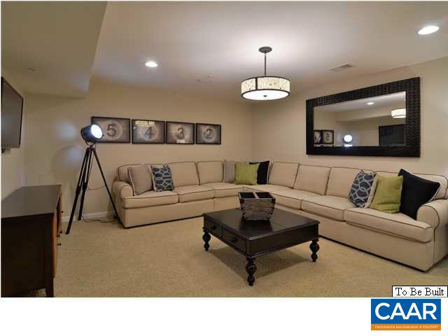 262 Ridgemont Road Ruckersville, VA 22968 - Photo 10 of 15 a living room with furniture and a flat screen tv